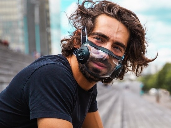 Man wearing a transparent respirator